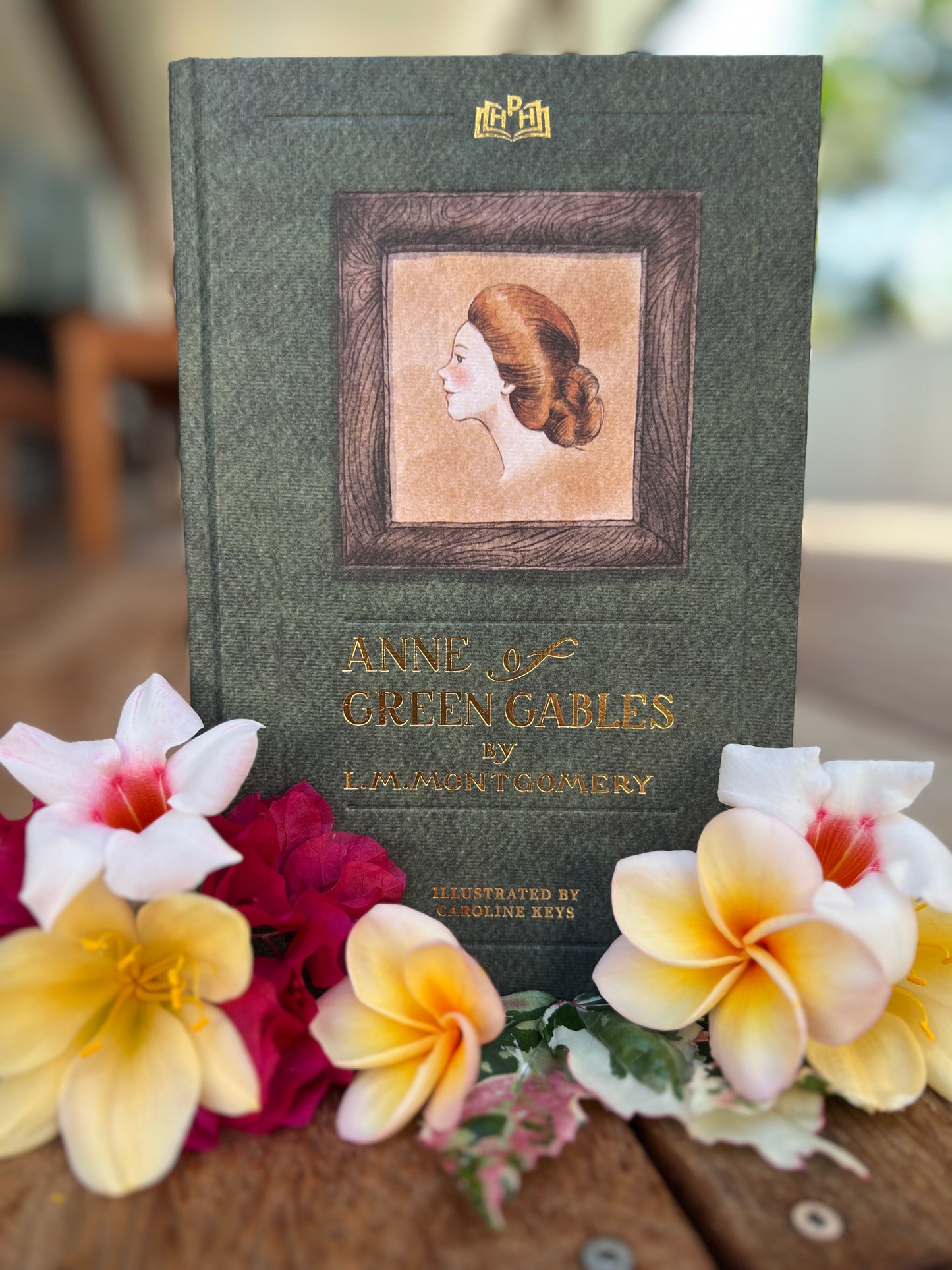 Classic Book Anne of Green Gables, hardcover and flowers