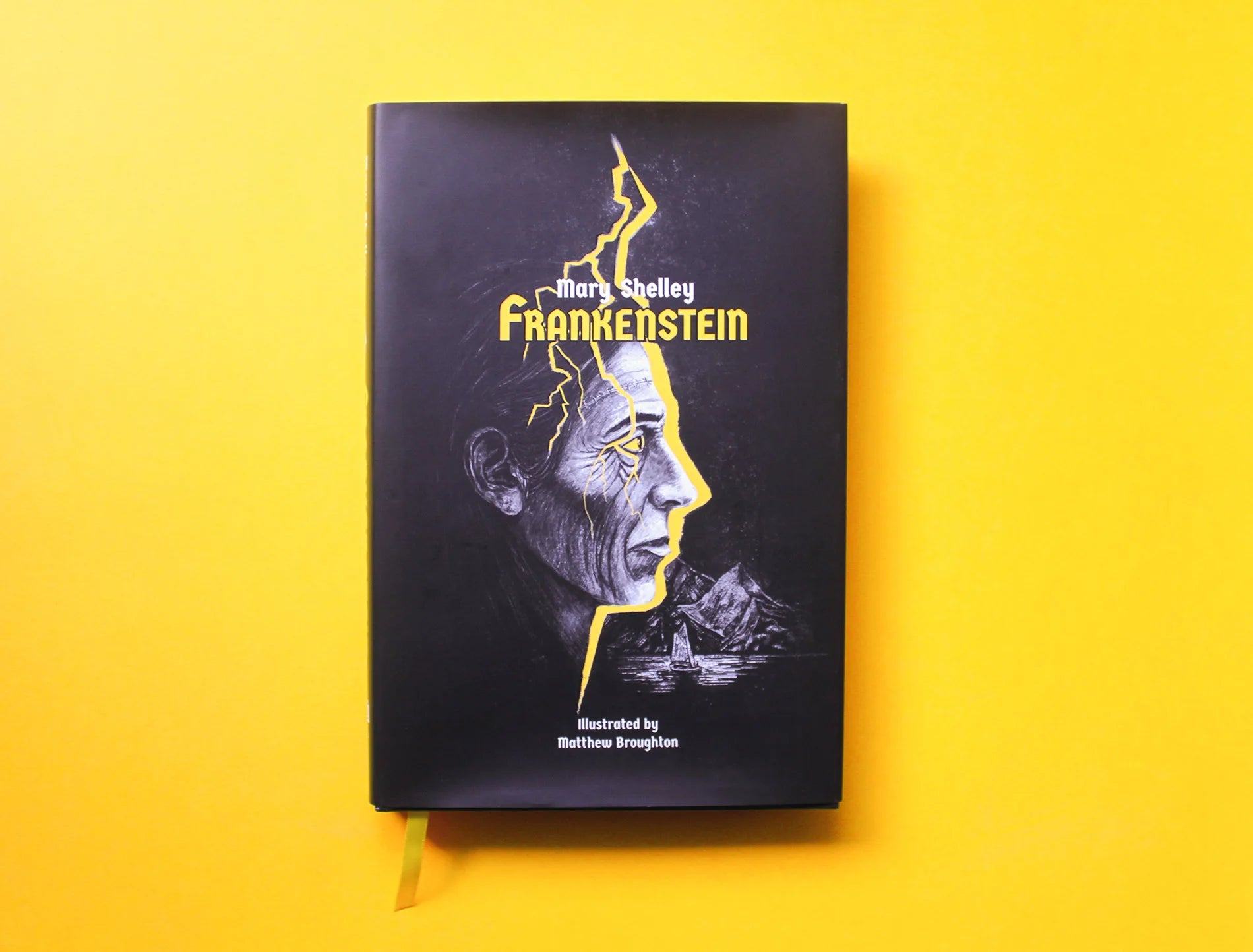 Frankenstein by Mary Shelley, illustrated by Matthew Broughton. This dust jack showing the monster with yellow eyes and a face outlined by lightening.