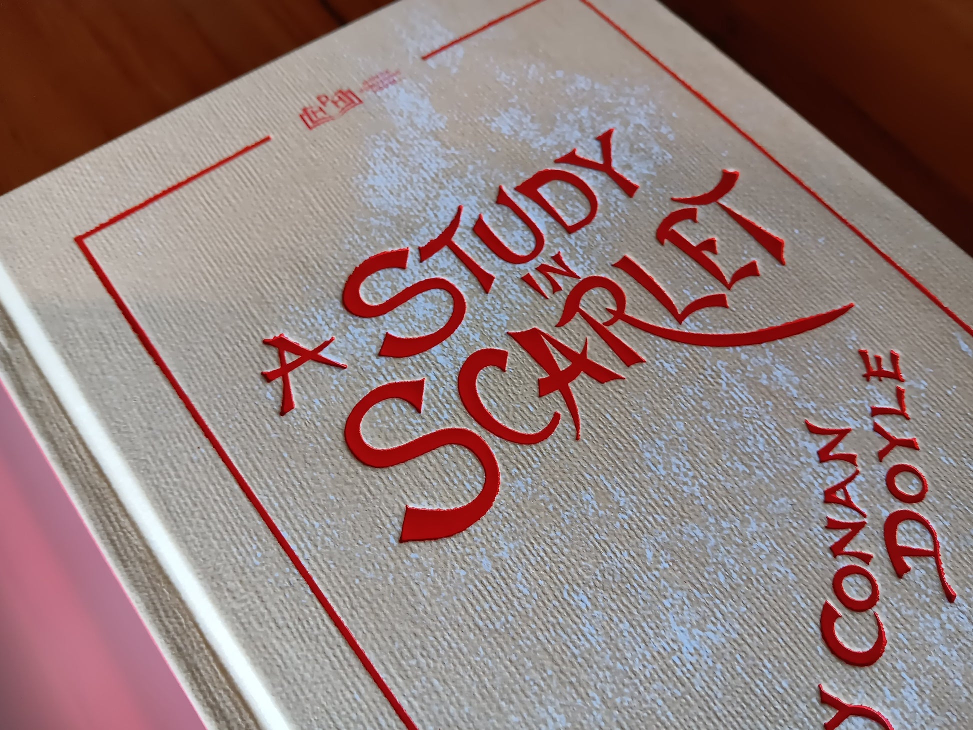 Classic book A Study in Scarlet hard cover lose up.